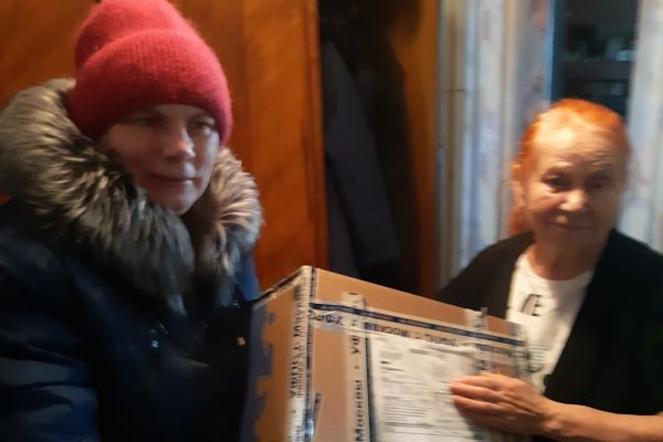 акция по выдаче продуктовых наборов к новогоднему столу 