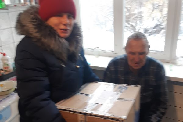 акция по выдаче продуктовых наборов к новогоднему столу 